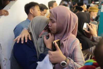 Islamic school in Indonesia collapses killing at least 1 and injuring dozens more