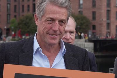Hugh Grant joins Hacked Off protest outside Labour conference in Liverpool