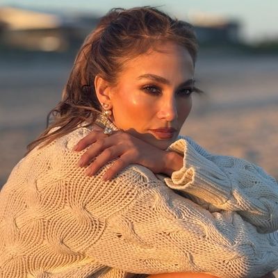 Jennifer Lopez Takes the Bloomers Trend Squarely Into Fall, With a Chunky Sweater and Boots