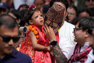 Two-year-old girl chosen as new living goddess following ancient ritual