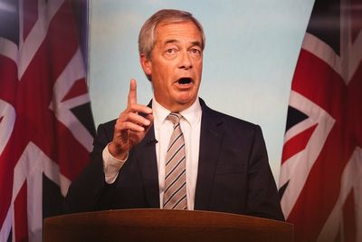 Farage hits out at Starmer after prime minister says Reform immigration policy is ‘racist’