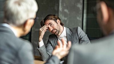 I Asked ChatGPT What Job Hugging Is and How It Could Be Hurting Your Income