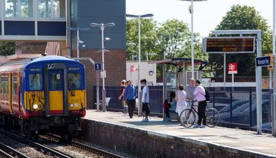 Police hunting young woman after man in his 60s pushed onto tracks at London rail station