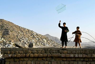 'I Couldn't Reach Them': Afghans Abroad Despair At Blackout