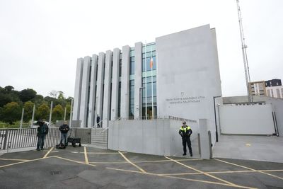Man charged with murder of his parents and brother