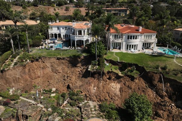 Hundreds of feet of coastal bluff in California fell toward the ocean in landslide-stricken town