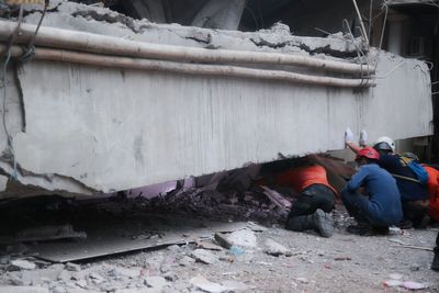 At least 91 students remain buried in rubble 2 days after school collapse in Indonesia