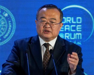 China replaces high-level diplomat after reported detention