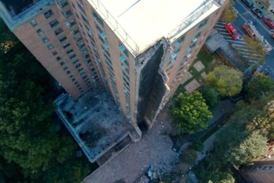 Investigation under way after 17-story New York apartment block partially collapses in suspected gas blast