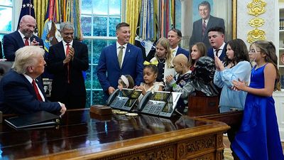 Donald Trump signs executive order to use AI in fight against childhood cancer