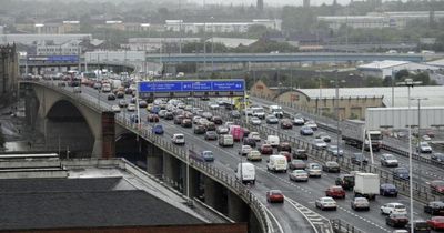 Lorry driver dies after 'load of wood' crashes onto busy motorway