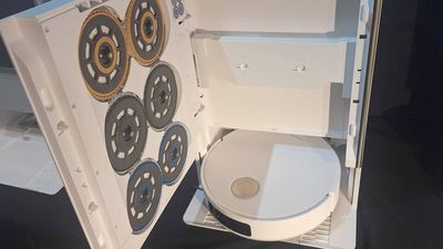 I'm equal parts impressed and intimidated by this new robovac's vending machine-style mopping setup