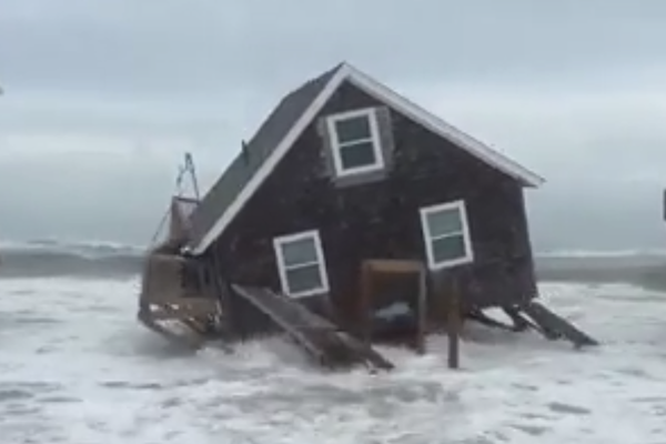 North Carolina homes crumble into ocean as Hurricanes Humberto and Imelda churn massive waves off Atlantic coast