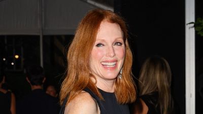 Julianne Moore proves that a sleek black dress and metallic handbag is the failsafe outfit formula that doesn't go out of fashion