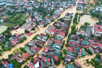 Tropical storm edges toward the Philippines and may grow to a typhoon on path toward China