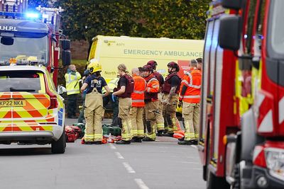 Four injured after car driven at people and man stabbed outside synagogue