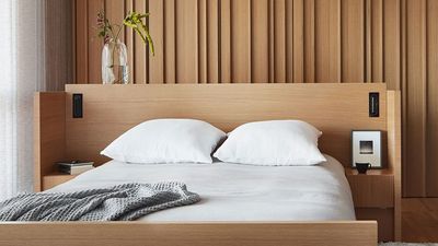 These Genius Hidden Bedside Reading Lamps Tuck Away When You're Not Using Them — They Don't Interfere in Your Design, and You're Never Left in the Dark