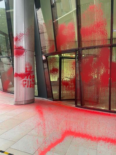 Windows smashed and red paint sprayed on building in City of London - sparking police probe