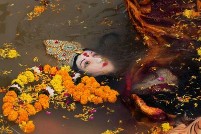Hindu festival photos are about fire and water, good and evil — simple but universal concepts