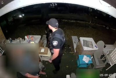 Moment police officers get caught in the middle of a drive-by shooting