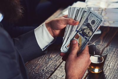 Why Do Some People Pretend to Be Rich While Drowning in Debt
