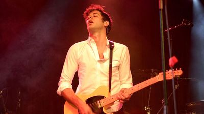 “I had this ridiculous fantasy of being like Slash with the top hat, no shirt, on stage shredding a Les Paul, but that wasn’t supposed to be me”: Mark Ronson says that he had to come to terms with the fact that he would never be a great guitar player