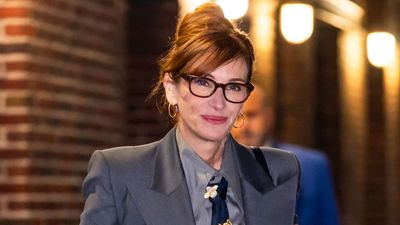 Julia Roberts recreates her iconic trouser suit and tie moment from 1990 in elegant grey tailoring