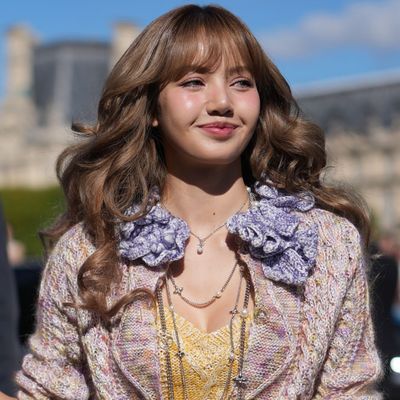 Blackpink's Lisa Trades Her Louis Vuitton Look for Gigi Hadid's Knitwear and Rare Nike Sneakers