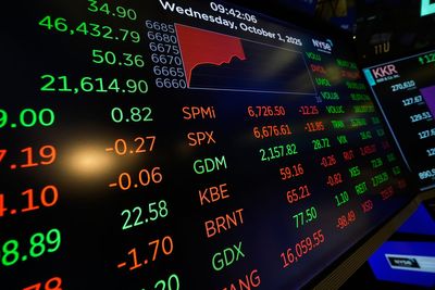 Asian shares are mixed as tech shares lead Wall Street ticks to more records