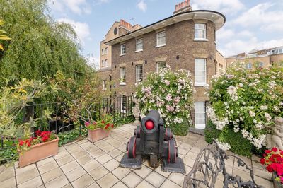 Extremely rare Georgian dockmaster's house by Tower Bridge and built into the dock walls on sale for £15m