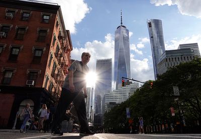 Why do so many global payments still require a layover in New York?