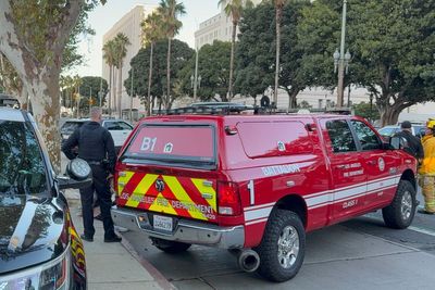 LA City Hall evacuated after driver with note addressed to Trump crashes into steps and barricades himself