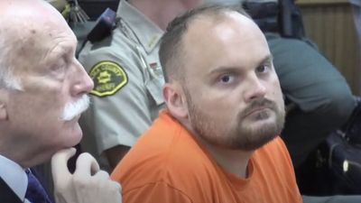 A woman was ‘sitting on top’ of her husband’s body with two gunshot wounds to his face. What really happened?