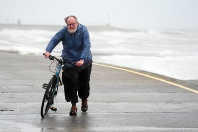 Storm Amy: UK braces for more travel disruption as man dies in brutal conditions