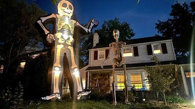 I put Home Depot's 12-foot Skelly and Lowe's 20-foot inflatable Skeleton in my yard — and this one wins Halloween
