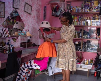 ‘We all need someone’: the hairdressers tackling stigma of mental health issues in west Africa
