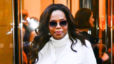 Oprah Winfrey's striking monochromatic look is an elevated take on leather, but it's her designer bag we've really got our eye on
