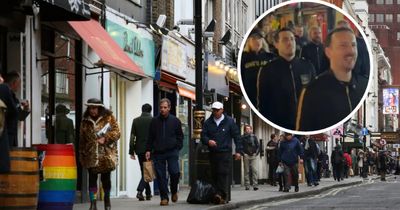 'Lunacy': Evangelical group in black uniforms target Soho street in bizarre protest