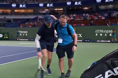 Jannik Sinner requires assistance leaving court after retirement in Shanghai