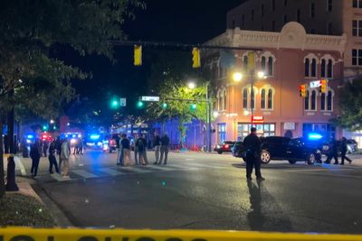 Gunmen kill two, injure 12 in a shootout in a crowd in Alabama capital city's downtown