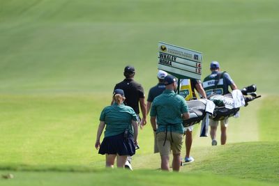 Vince Whaley has an audience with a set of teeth. He hits shot with alligator behind him