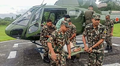Rescuers Scramble To Deliver Aid After Deadly Nepal, India Floods