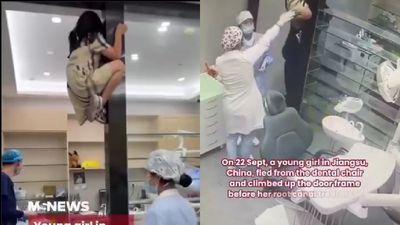 Not today, doc: Girl climbs dental office walls like Spider-Man to dodge a root canal