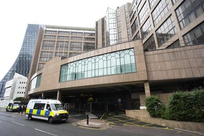 Police probe 'attempted arson' at Canary Wharf migrant hotel