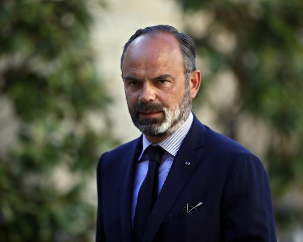 Macron should announce early election, says former PM as France’s political crisis deepens