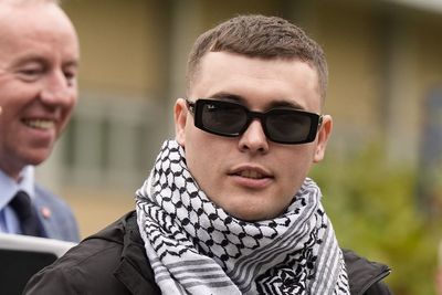 Prosecutors appeal against decision to dump terror case against Kneecap rapper