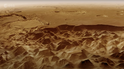 Soar through a 1,000-mile-long maze on Mars in this mesmerizing new satellite video