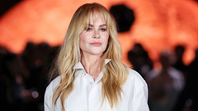 Nicole Kidman's wide-leg jeans and oversized white shirt are a masterclass in chic Parisian styling