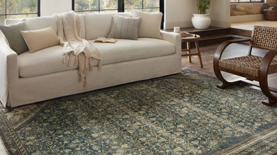 I wasn't having any luck finding a vintage rug to work in my busy home – but Joanna Gaines has designed the perfect washable design that looks old but behaves like new