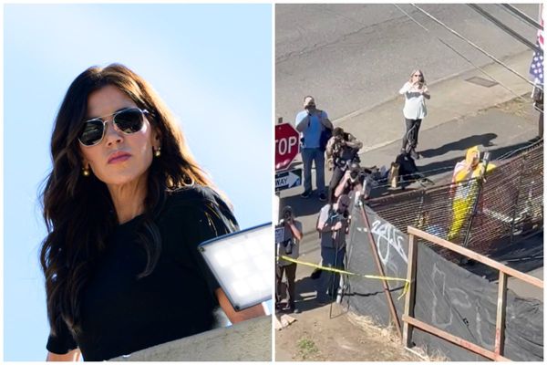 Kristi Noem praised for ‘staring down’ Antifa. It was a dozen reporters and a guy in a chicken suit
